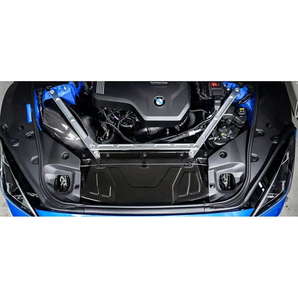 Eventuri carbon intake sæt til Toyota Supra MK5 2.0 B48 med kulfiber luftfilterhus, indtagsrør og rød performance luftfilter.
